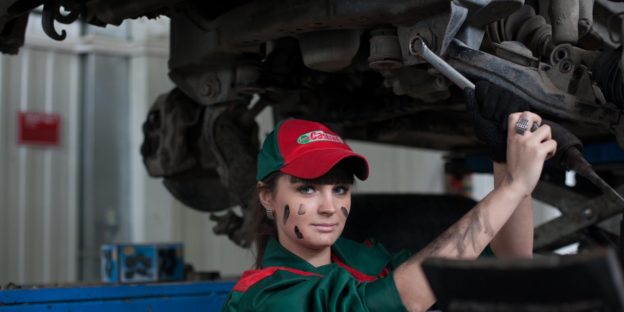 mechanic checking a vehicle