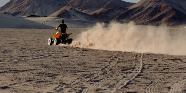 person riding an ATV