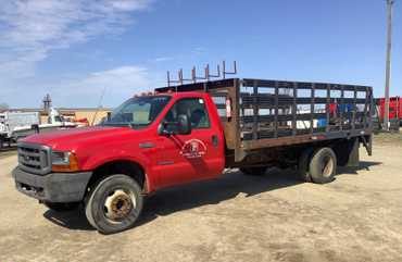 1999 Ford F-450 16’ Stake Truck