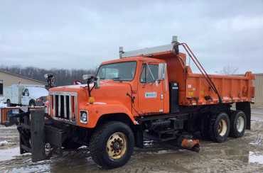 2003 International 2574 Dump Truck with Belly and Side Blade