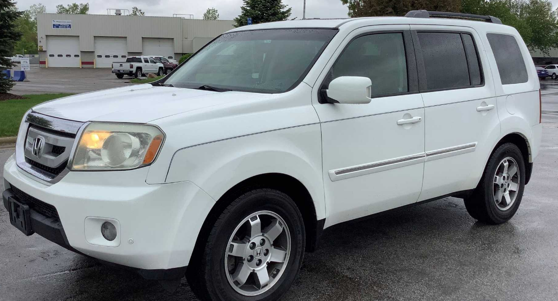 2009 Honda Pilot Touring 4WD with RES & Navigation Sport Utility 4-DR