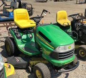 John Deere model 102 lawn and garden tractor with a 42″ wide edge system cutting deck