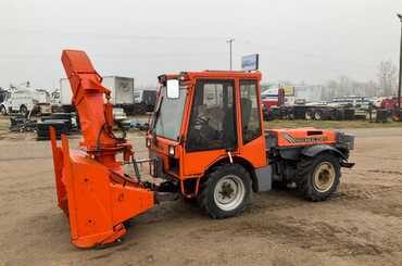 Holder 524 Tractor with Snowblower Attachment