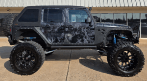 repo vehicle with a lift kit for sale at by a credit union in OK