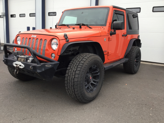 repo 2015 Jeep Wrangler (Sport) for sale at a bank