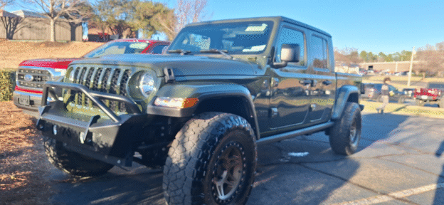 repossessed Jeep Gladiator Crew Cab Sport 4WD for sale at a bank