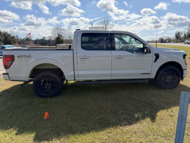 repo 2024 Ford F-150 XLT 4×4 for sale at a bank